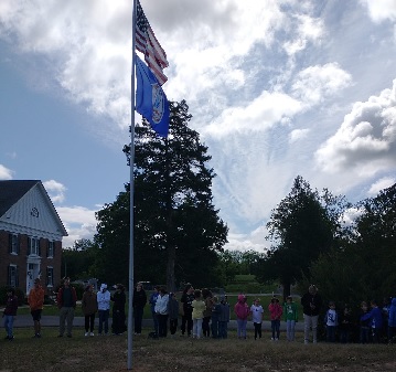Virginia Commissioner of Agriculture attends flagpole ceremony at Light of the World Academy