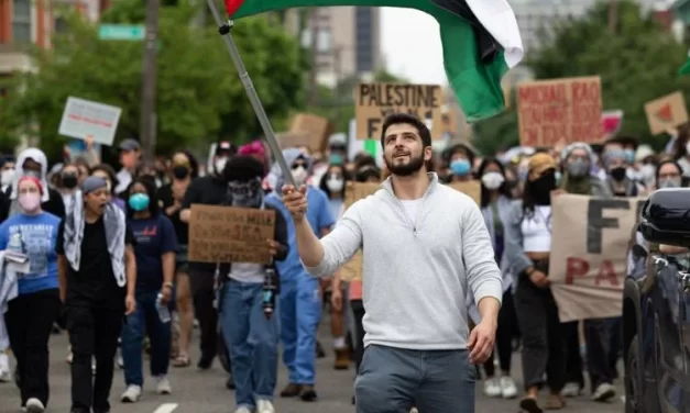 Pro-Palestine protesters march to Kaine’s office, block Richmond intersection
